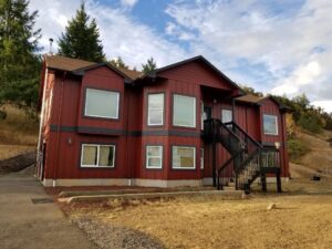 Residential apartment exterior after repaint - Yoncalla